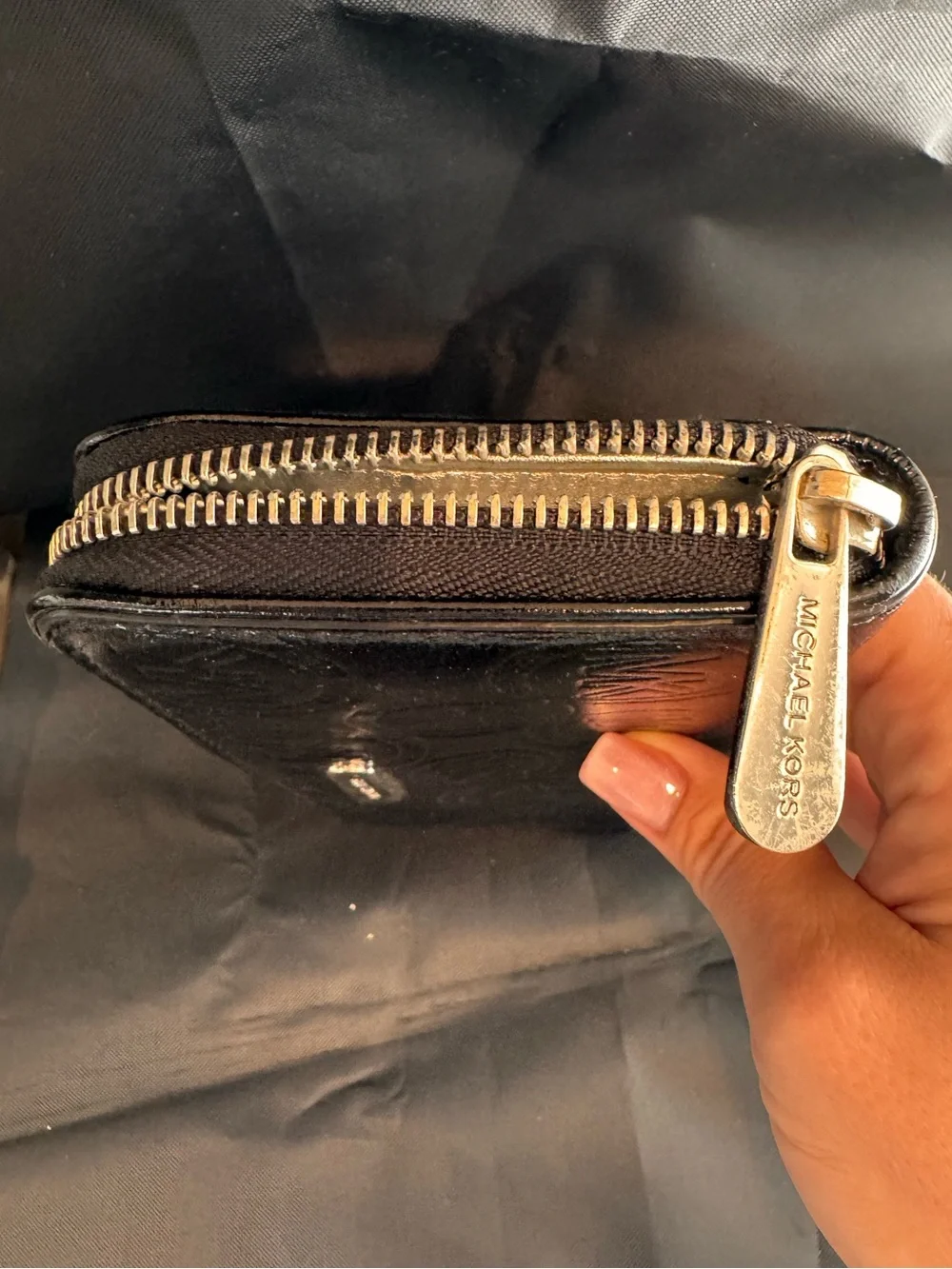 Michael Kors Black Embossed Logo Zip Wallet with Gold Accent